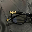 oculos chrome hearts preto e dourado